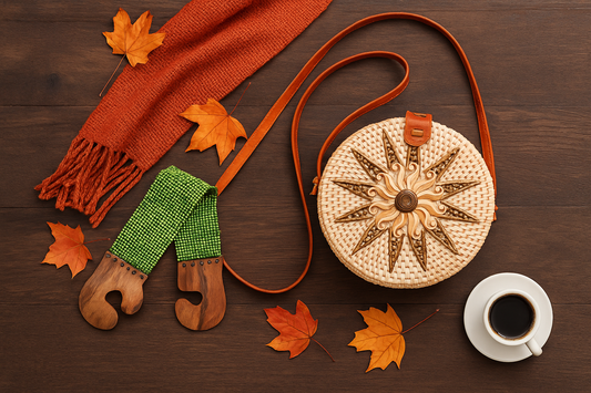 Cozy fall weekend flat lay with handmade rattan bag, beaded belt with wooden buckle, coffee cup, scarf, and autumn leaves – boho chic handmade style.