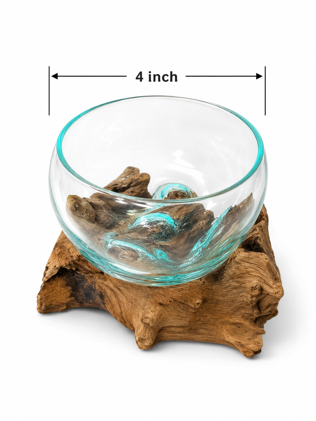 Hand blown glass bowl on driftwood