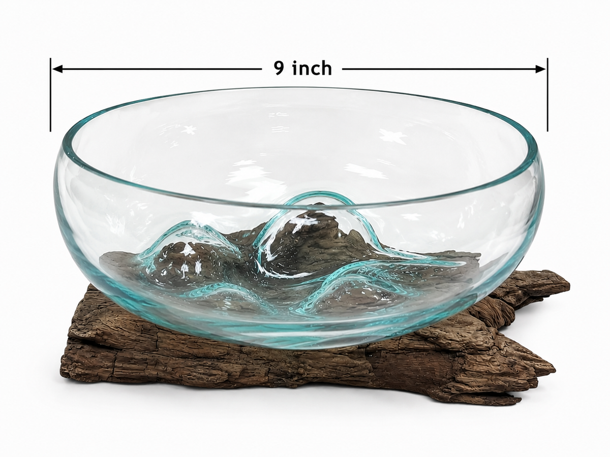 Hand blown glass bowl on driftwood