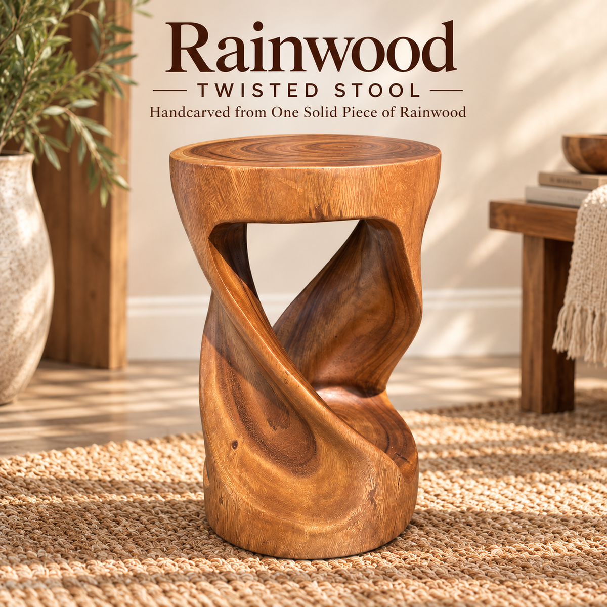 Hand-carved Rainwood accent table styled in an entryway