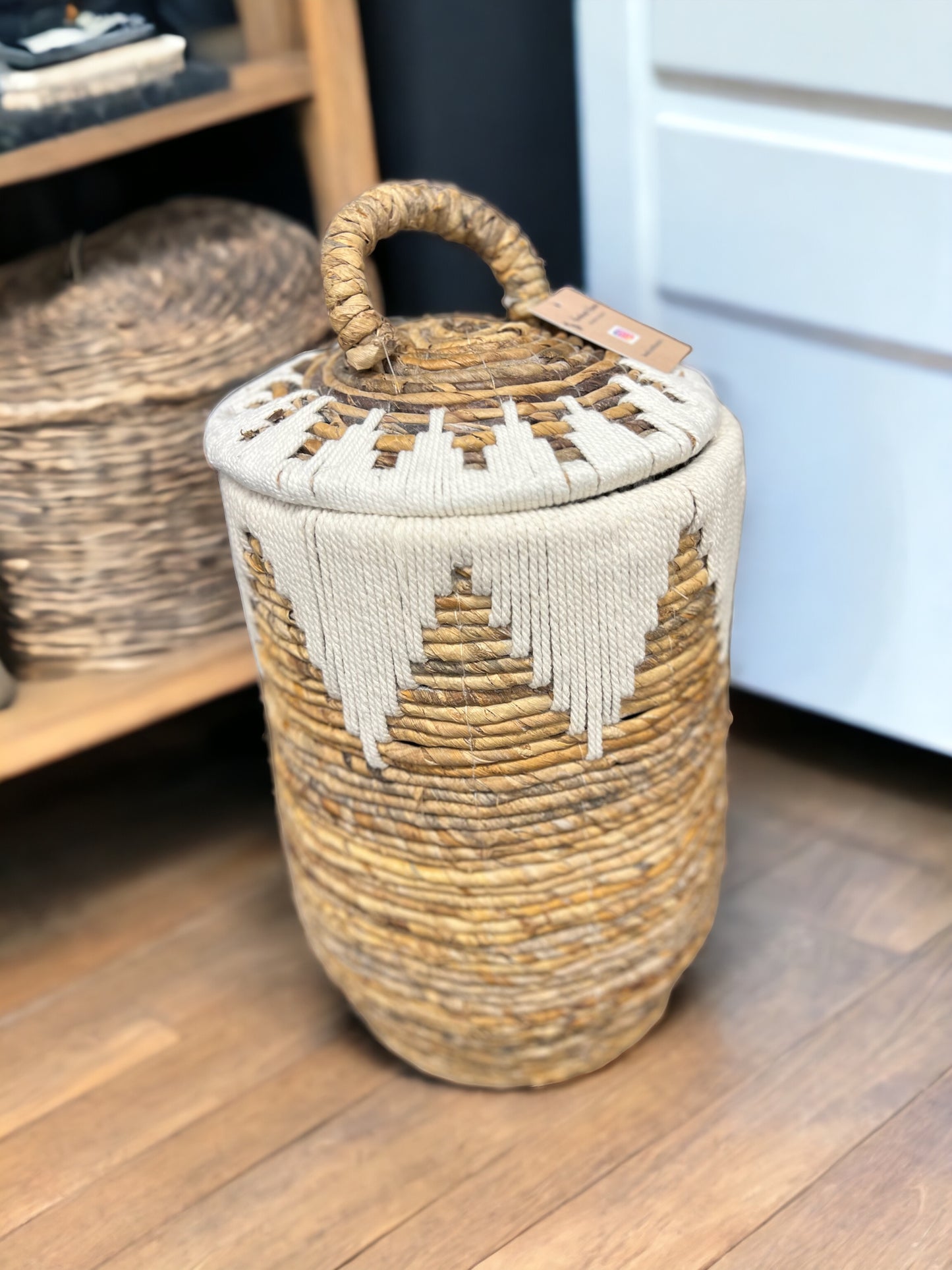 <span data-mce-fragment="1"></span> <p>Bring a touch of exotic charm to your home with our Tropical Treasures Handwoven Banana Leaf Basket. Crafted by skilled artisans using traditional techniques, each basket is a testament to the beauty of natural materials and meticulous craftsmanship.</p>