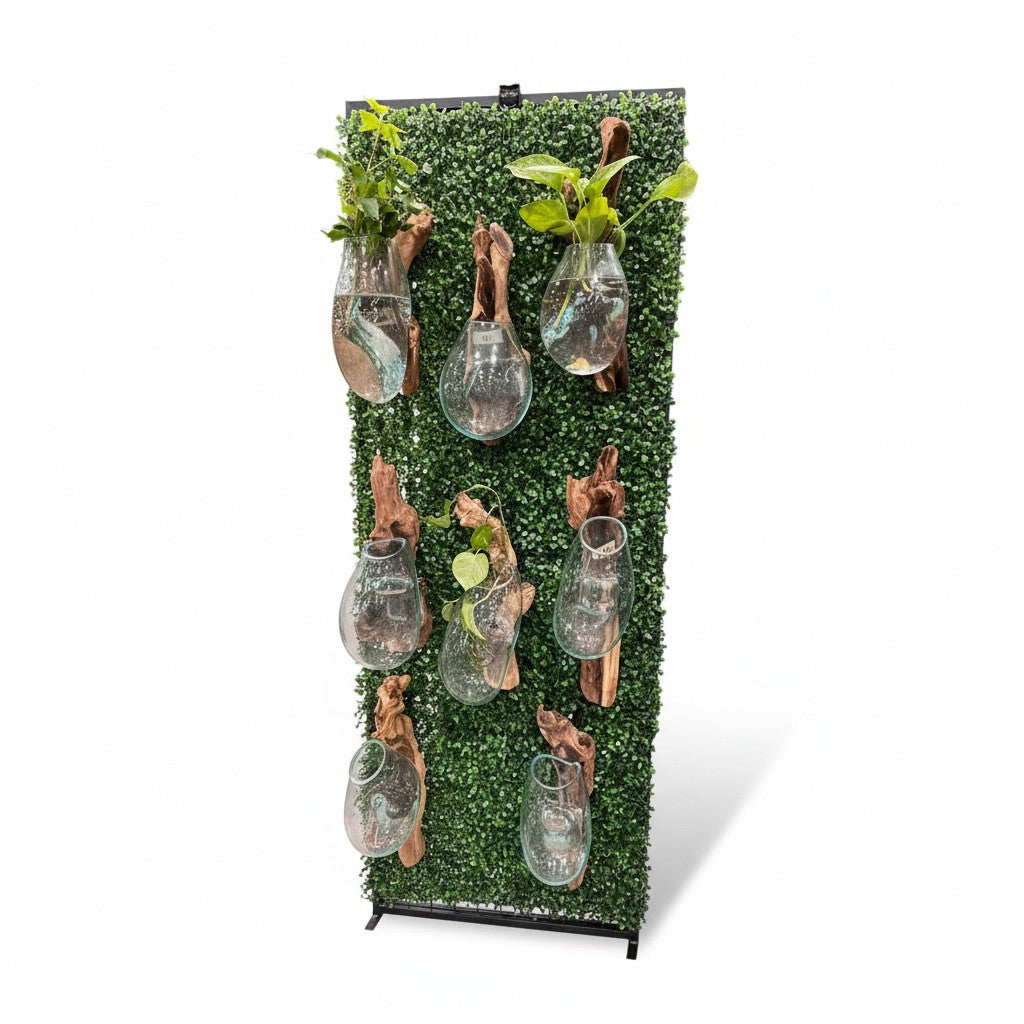 Wall-mounted planters with glass bulbs and wooden accents on a green background