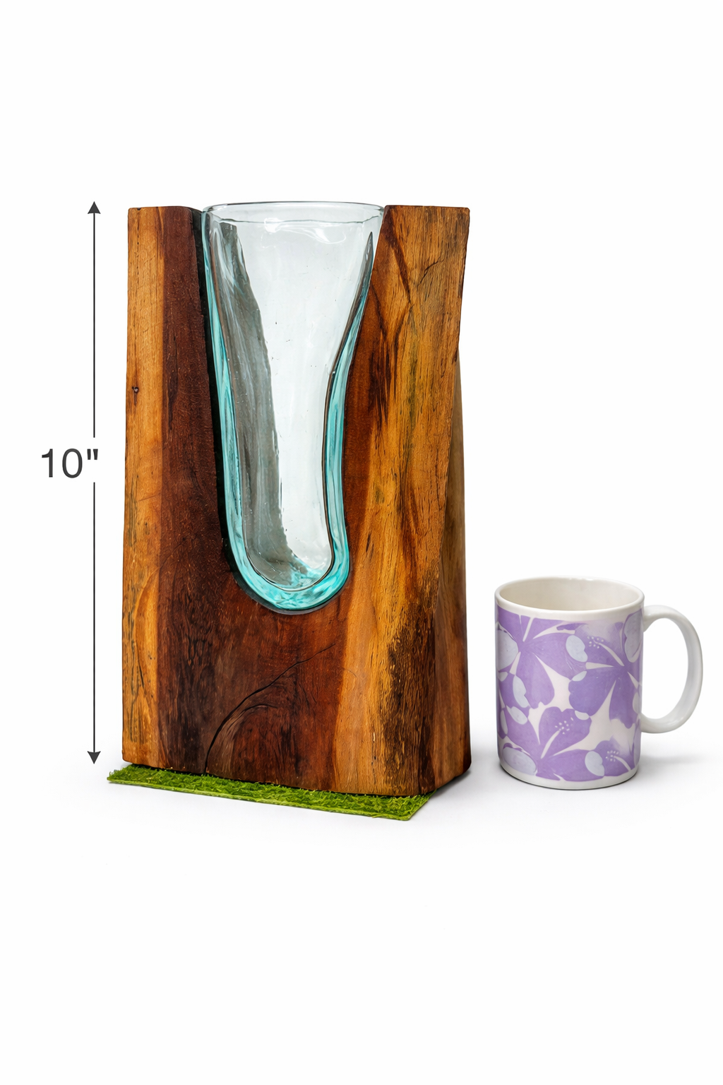 Wooden vase with glass insert next to a mug on a white background