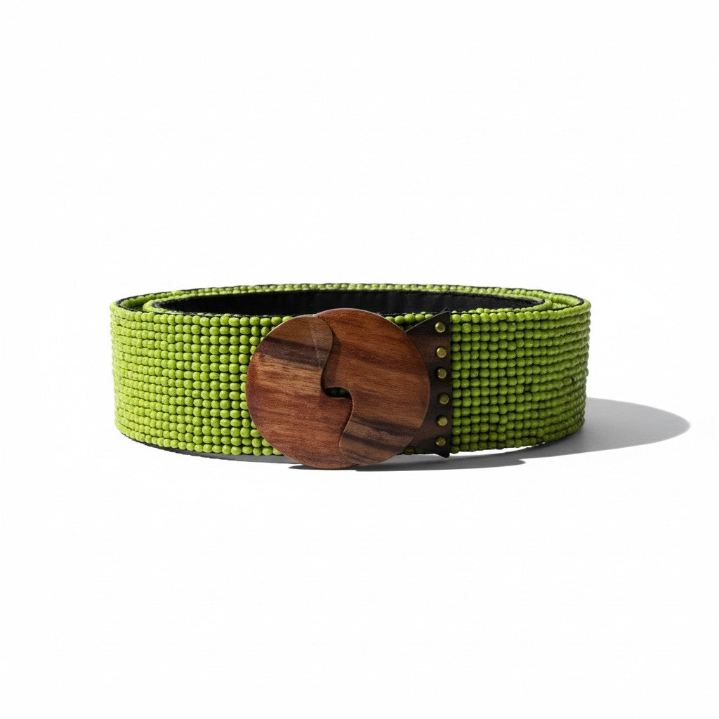Green belt with a wooden buckle on a white background