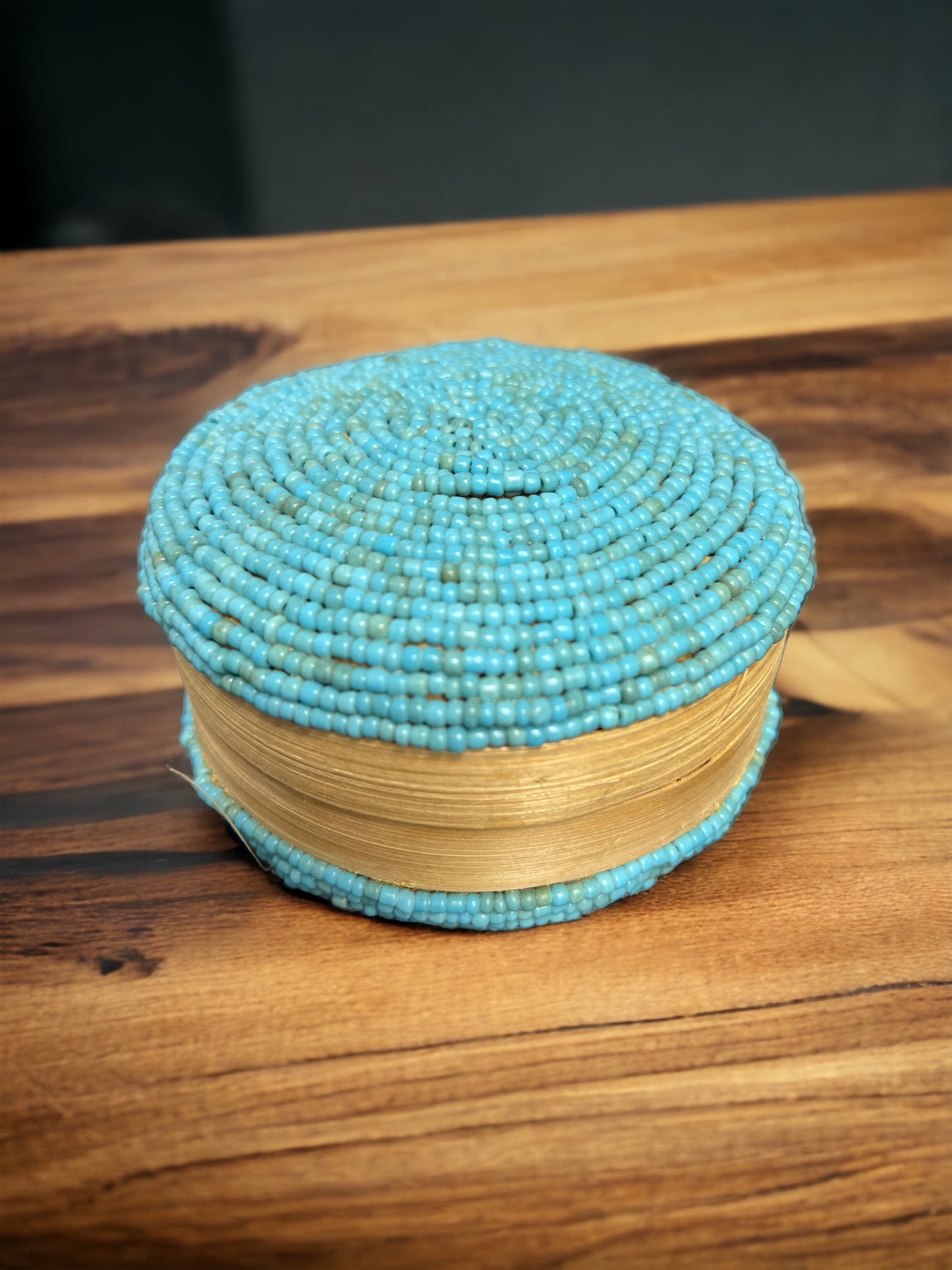 Elevate your jewelry storage with our Beaded Jewelry Box Round. With its handcrafted beauty and practical design, it's the perfect accessory for organizing and displaying your most treasured pieces.