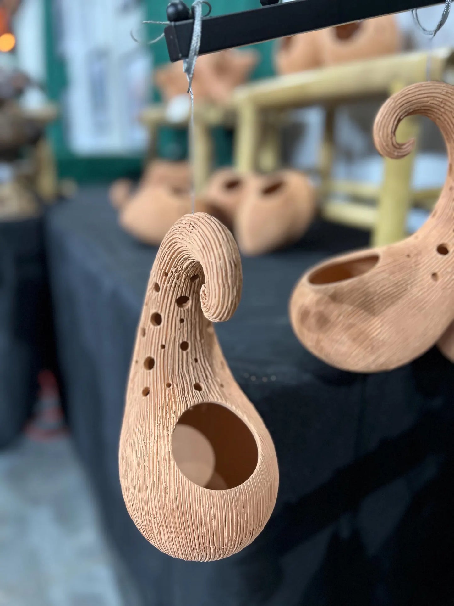 Guard Terracotta pots on a stand with blurred background