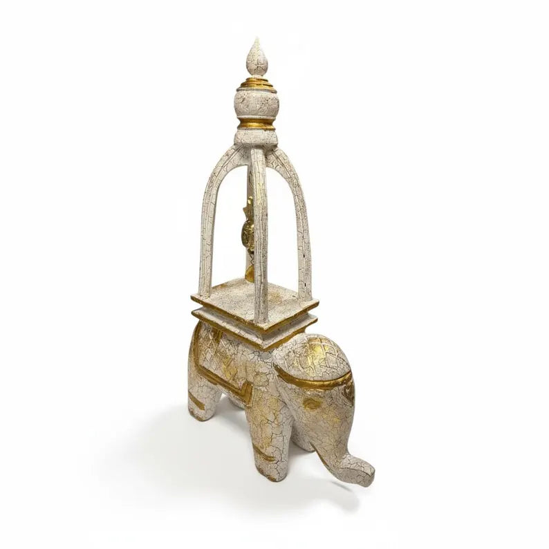 Decorative elephant with a tower on a white background