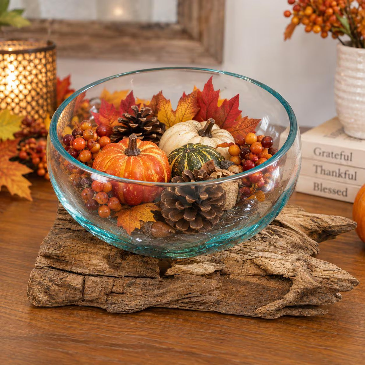 Hand blown glass bowl on driftwood